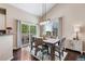 Open dining room with sliding glass doors and plenty of natural light at 6825 S Webster St # A, Littleton, CO 80128