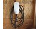 Tesla charger installed in garage, ready for fast and efficient electric vehicle charging at home at 9486 Juniper Way, Arvada, CO 80007