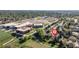 Aerial shot of a school with sports fields near residential homes with green trees, marked with an 'R' icon at 4374 E Peakview Cir, Centennial, CO 80121