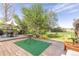 Spacious backyard featuring a patio with outdoor seating and grill, and a playground at 4374 E Peakview Cir, Centennial, CO 80121