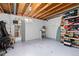 Spacious basement with exposed ceiling beams offering ample storage at 4374 E Peakview Cir, Centennial, CO 80121