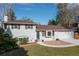 Charming two-story home with a well-manicured lawn, bay window, a driveway, and a two-car garage at 4374 E Peakview Cir, Centennial, CO 80121