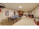 Spacious basement with ample space for Gathering activities and recreation at 6544 E Alaska Dr, Denver, CO 80224