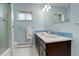 Bathroom with dual sinks, and granite countertops at 6544 E Alaska Dr, Denver, CO 80224