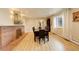 Formal dining room featuring a fireplace, large table, and lots of natural light at 6544 E Alaska Dr, Denver, CO 80224