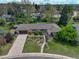 A charming ranch-style home with a well-manicured lawn and a welcoming walkway to the front door at 6544 E Alaska Dr, Denver, CO 80224