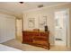 Bedroom featuring hardwood floors and ensuite bath at 6544 E Alaska Dr, Denver, CO 80224