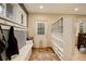 Welcoming mudroom with hooks, storage cubbies, and seating at 6544 E Alaska Dr, Denver, CO 80224