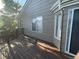 Back deck exterior with natural colored siding at 1354 Avgare Way, Erie, CO 80516