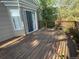 Outdoor wood deck with natural-colored siding and sunlight at 1354 Avgare Way, Erie, CO 80516