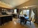 Eat-in kitchen features a stainless steel appliances and a breakfast nook with table at 1354 Avgare Way, Erie, CO 80516