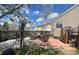 Backyard patio with an outdoor seating area, perfect for relaxing and entertaining at 1354 Avgare Way, Erie, CO 80516
