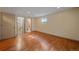Finished basement features hardwood floors, access to bath and laundry at 5741 E 120Th Pl, Brighton, CO 80602