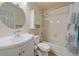 Bright bathroom featuring vanity, medicine cabinet, and tub with shower at 5741 E 120Th Pl, Brighton, CO 80602
