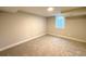 Bedroom with neutral carpet and a window at 2090 S Clinton St, Denver, CO 80231