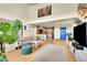 Open-concept living area with bright interior, hardwood floors, and high ceilings at 2351 Federal Blvd # 401, Denver, CO 80211
