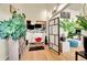 Bright office space with hardwood floors, plants, a modern desk, and natural light at 2351 Federal Blvd # 401, Denver, CO 80211