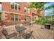 Wooden patio featuring comfortable seating and a fire pit, offering a relaxing outdoor space at 2351 Federal Blvd # 401, Denver, CO 80211
