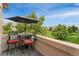 Outdoor balcony with seating and views of the neighborhood at 10760 Eliot Cir # 204, Denver, CO 80234