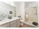 Renovated bathroom with shower, modern vanity, and sleek fixtures at 10760 Eliot Cir # 204, Denver, CO 80234
