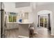 Bright kitchen showcasing a breakfast bar, stainless steel appliances and backyard access at 10760 Eliot Cir # 204, Denver, CO 80234