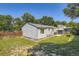 The property has a well-maintained lawn, a cabana on the patio, and a wooden fence at 4849 S Pitkin Way, Aurora, CO 80015