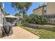 Backyard with a patio, cabana, and lush landscaping at 4849 S Pitkin Way, Aurora, CO 80015