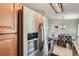 Modern kitchen with stainless steel appliances and a bright breakfast nook at 4849 S Pitkin Way, Aurora, CO 80015