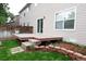 Inviting backyard deck with easy access from the house, perfect for outdoor relaxation and entertaining at 849 Canary Ln, Brighton, CO 80601