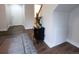 Entryway with wood-look flooring and black accent cabinet at 849 Canary Ln, Brighton, CO 80601