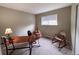 Bright home office featuring a desk, chair, and natural light from the window at 849 Canary Ln, Brighton, CO 80601