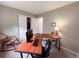 Home office with neutral walls and a comfortable workspace at 849 Canary Ln, Brighton, CO 80601