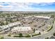 Commercial zone with parking lots and retail stores, showcasing the building's facade at 2908 N Florence St, Denver, CO 80238