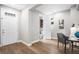 Bright Home office with hardwood floors and a view of the attached bathroom at 2908 N Florence St, Denver, CO 80238