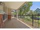 Spacious balcony with decorative iron railing and tree lined views, perfect for outdoor relaxation and entertaining at 1521 Vine St # 101, Denver, CO 80206