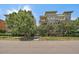 Beautiful condo building with manicured landscaping and lovely balconies at 1521 Vine St # 101, Denver, CO 80206