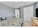 Bedroom with carpet, walk-in closet and view of adjoining bathroom at 11285 Iola St, Commerce City, CO 80640
