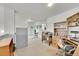 Versatile loft area with desk, access to other rooms, and ample lighting at 11285 Iola St, Commerce City, CO 80640