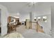 Spacious loft area with natural light, perfect for a home office or study, with views of the entryway below at 11285 Iola St, Commerce City, CO 80640