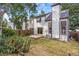 Backyard view with grass lawn, patio and modern siding in this outdoor living space at 3713 S Ensenada St, Aurora, CO 80013
