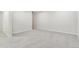 Large, carpeted basement space with white walls and baseboards, ready for customization at 3713 S Ensenada St, Aurora, CO 80013