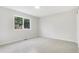 Bright bedroom with natural light and neutral carpet at 3713 S Ensenada St, Aurora, CO 80013