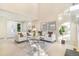 Airy living room showcasing vaulted ceilings and modern furnishings at 3713 S Ensenada St, Aurora, CO 80013