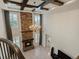 High angle view of living room with a floor-to-ceiling fireplace and coffered ceiling at 11999 S Stroll Ln, Parker, CO 80138