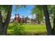 Neighborhood playground with slides and climbing structures, surrounded by trees at 6543 13Th St, Frederick, CO 80530