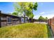Spacious lawn with backyard, patio, and fence offers room to enjoy outdoor living at 6598 S Logan St, Centennial, CO 80121