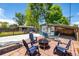 Stone patio features outdoor seating and a fire pit, ideal for backyard entertaining at 6598 S Logan St, Centennial, CO 80121
