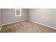 Finished basement featuring neutral paint and carpeting at 6598 S Logan St, Centennial, CO 80121
