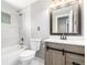 Well-maintained bathroom featuring modern vanity, new fixtures, and updated shower at 6598 S Logan St, Centennial, CO 80121