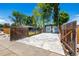 Large driveway leads to a two-car garage and a fenced backyard, perfect for outdoor enjoyment at 6598 S Logan St, Centennial, CO 80121